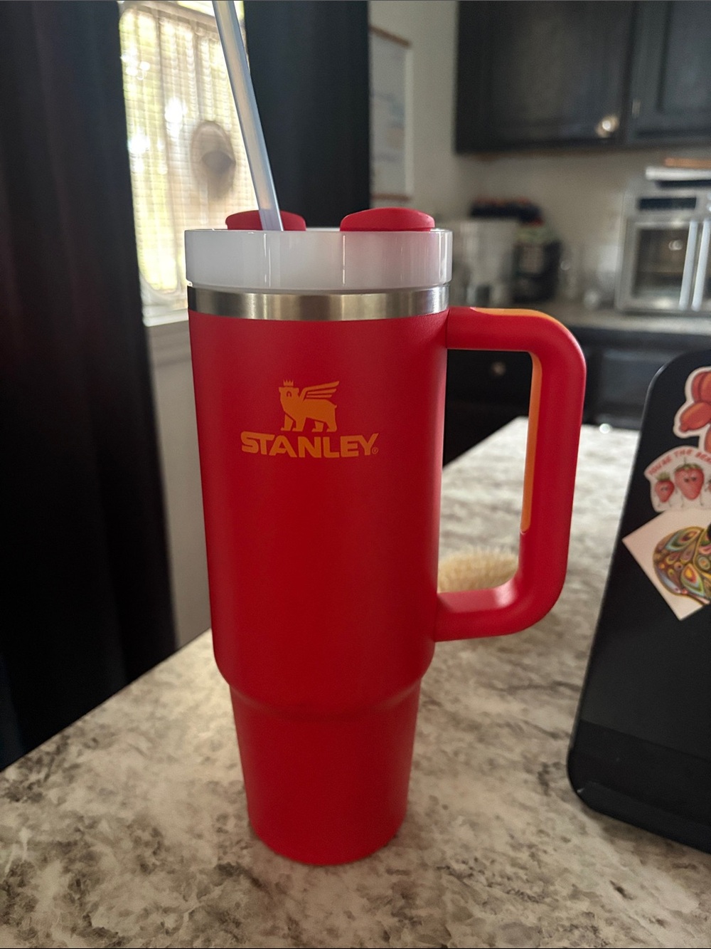 Stanley Red Travel Mug with Handle and orange Logo
